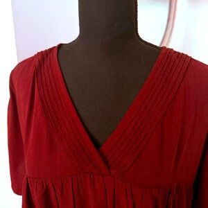 NWT Madewell top color is maroon. Size Large.